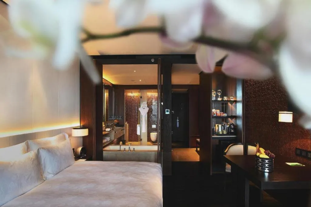 Bed in OCT Bay Breeze Hotel