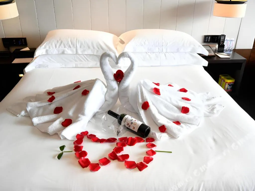 Bed in OCT Bay Breeze Hotel