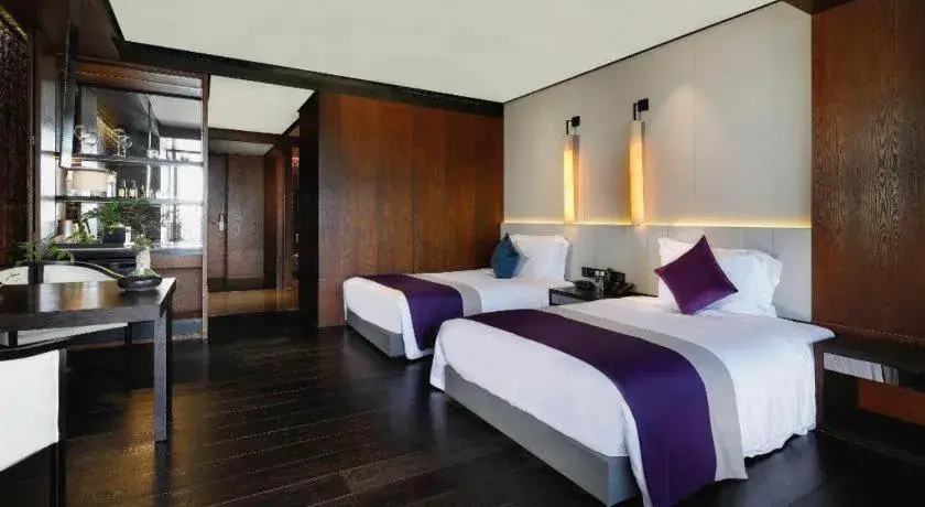 Bed in OCT Bay Breeze Hotel Bed in OCT Bay Breeze Hotel