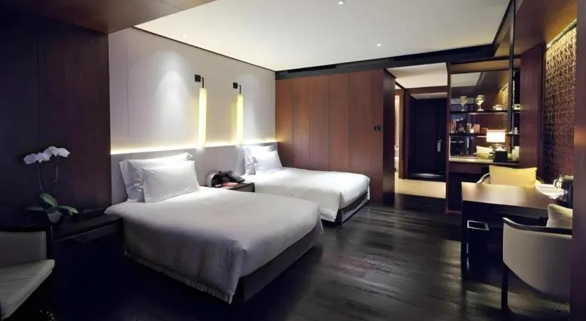 Bed in OCT Bay Breeze Hotel