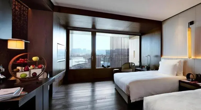 Bed in OCT Bay Breeze Hotel Bed in OCT Bay Breeze Hotel