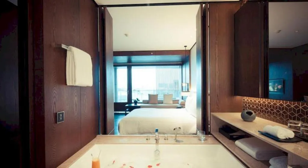 Bed in OCT Bay Breeze Hotel