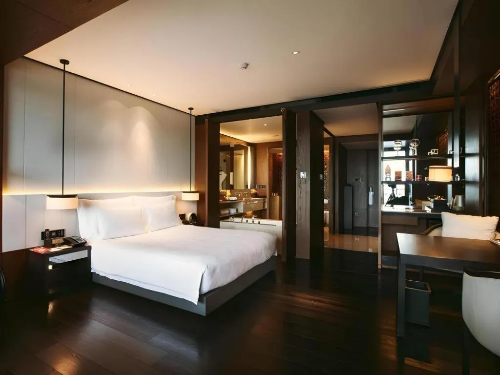 Bed in OCT Bay Breeze Hotel