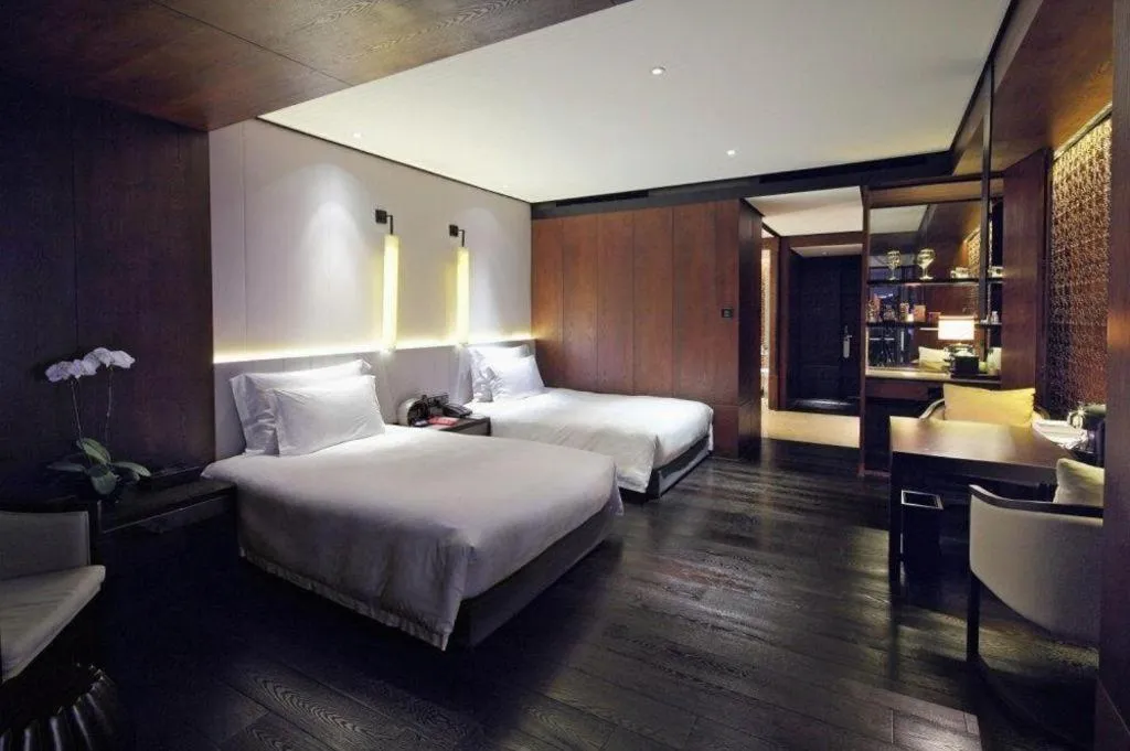 Bed in OCT Bay Breeze Hotel