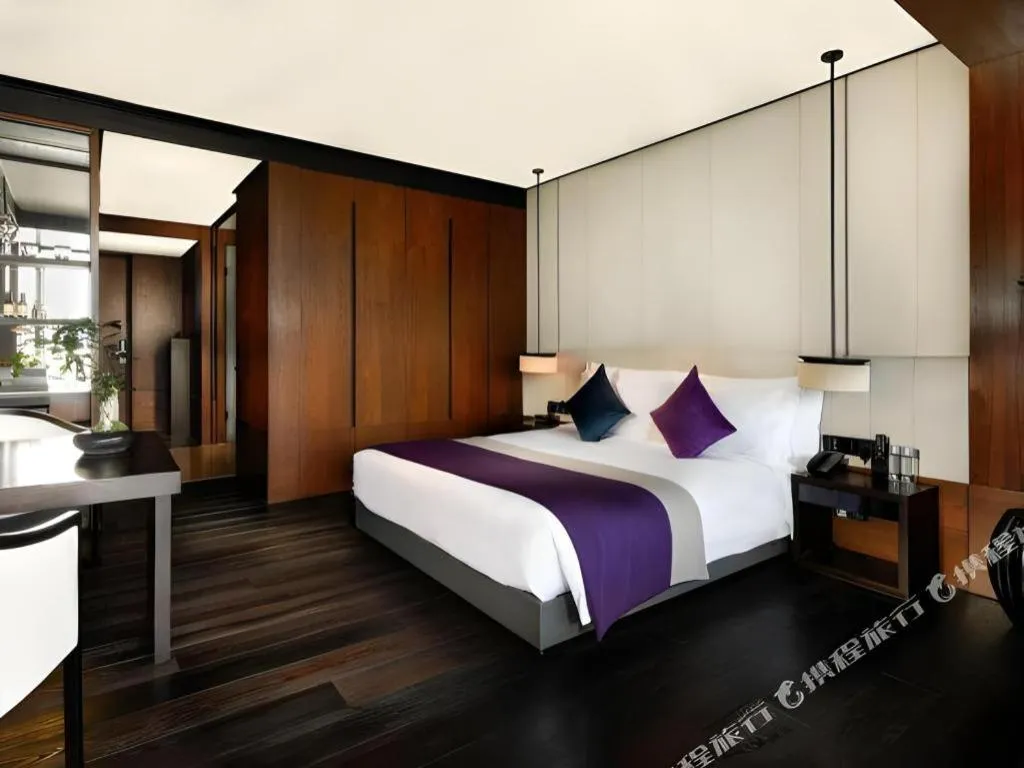 Bed in OCT Bay Breeze Hotel