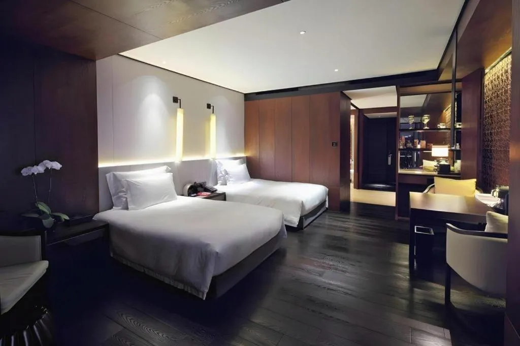 Bed in OCT Bay Breeze Hotel