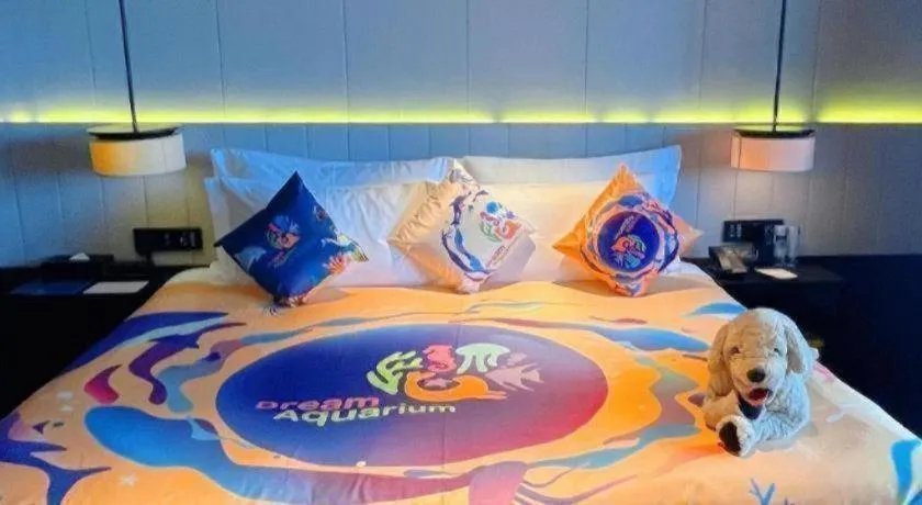 Bed in OCT Bay Breeze Hotel