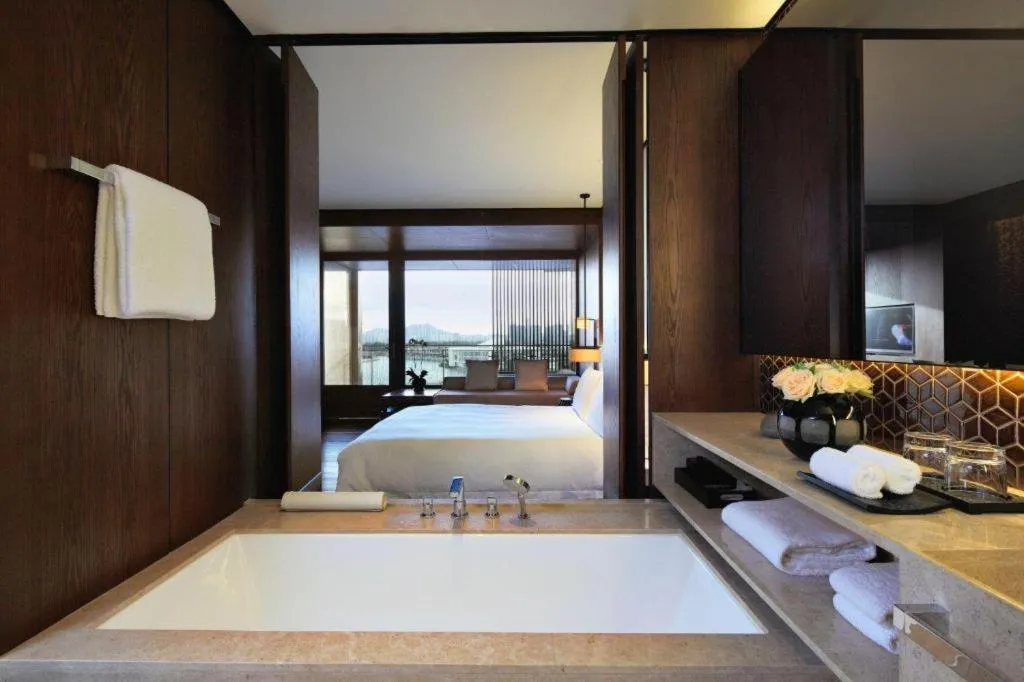 Bed in OCT Bay Breeze Hotel