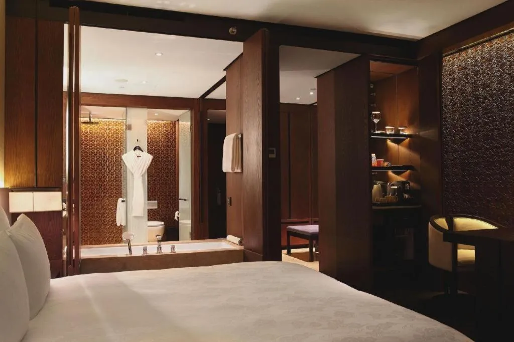 Bed in OCT Bay Breeze Hotel