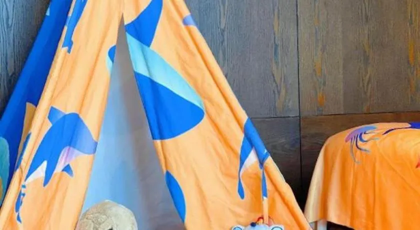 Bed in OCT Bay Breeze Hotel