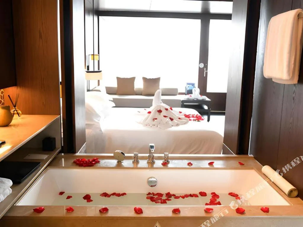 Bed in OCT Bay Breeze Hotel