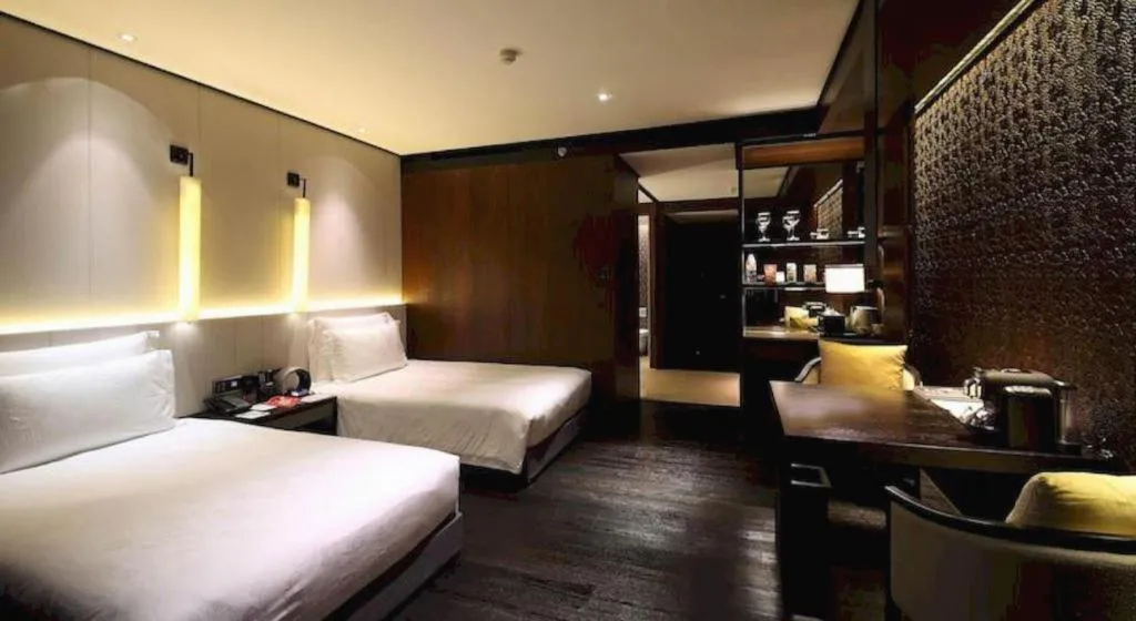 Bed in OCT Bay Breeze Hotel