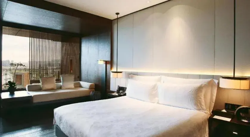 Bed in OCT Bay Breeze Hotel Bed in OCT Bay Breeze Hotel