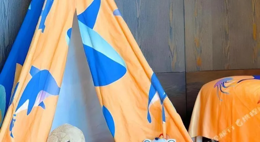 Bed in OCT Bay Breeze Hotel