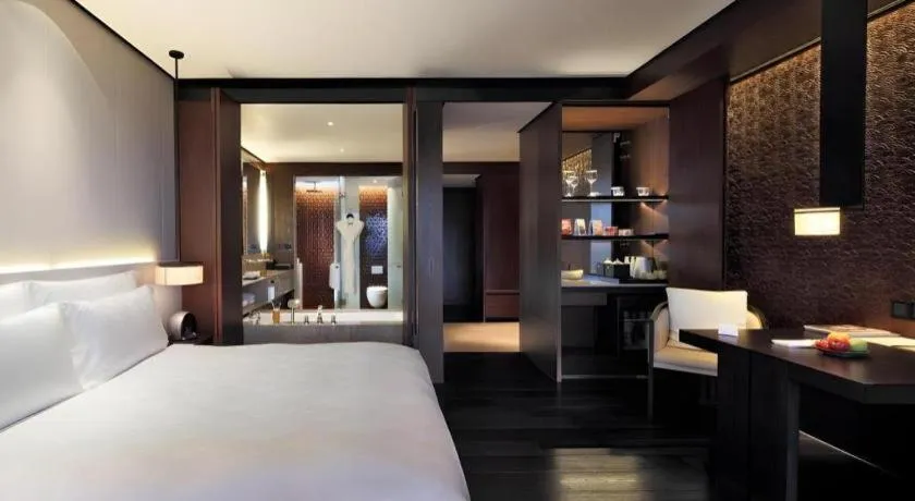 Bed in OCT Bay Breeze Hotel