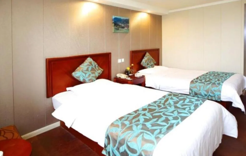 Bed in GreenTree Inn Wuxi Guangrui Road Hotel