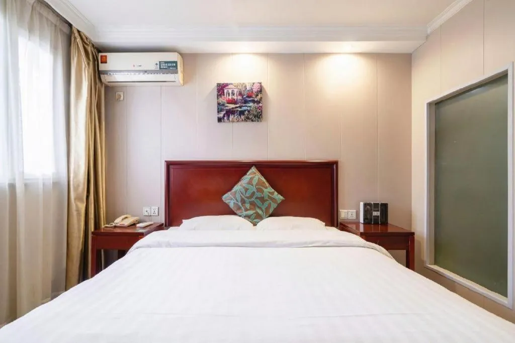 Bed in GreenTree Inn Wuxi Guangrui Road Hotel