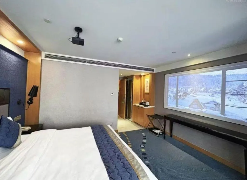 Bed in Grand Skylight Hotel KaiMei