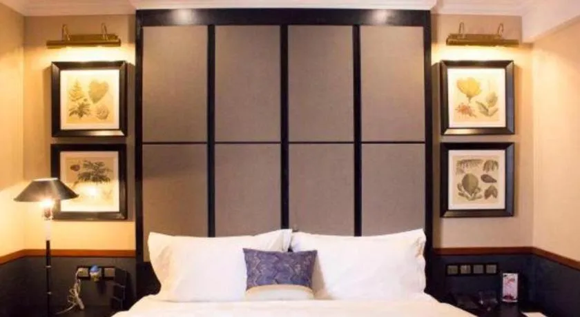 Bed in Grand Skylight Hotel KaiMei