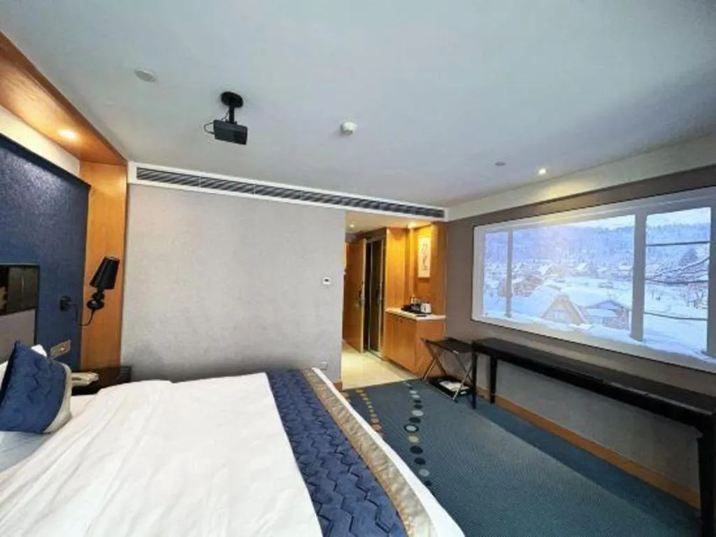 Bed in Grand Skylight Hotel KaiMei