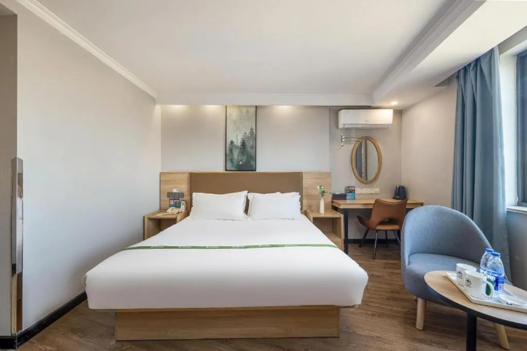 Bed in GreenTree Inn Jiaxing Tongxiang Tudian Express Hotel