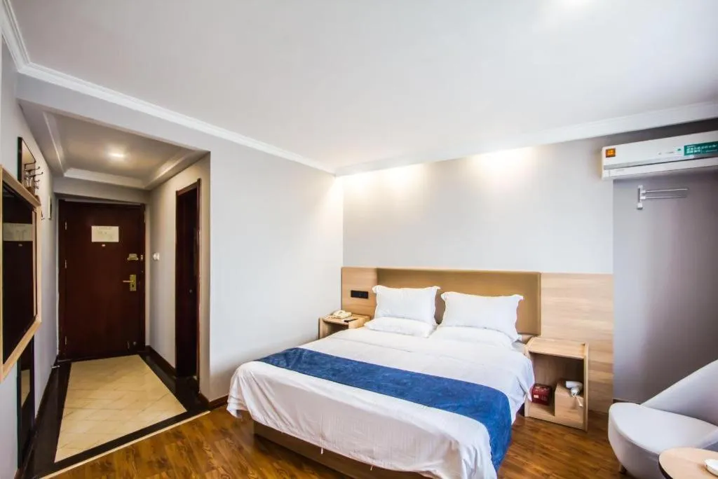 Bed in GreenTree Inn Jiaxing Tongxiang Tudian Express Hotel