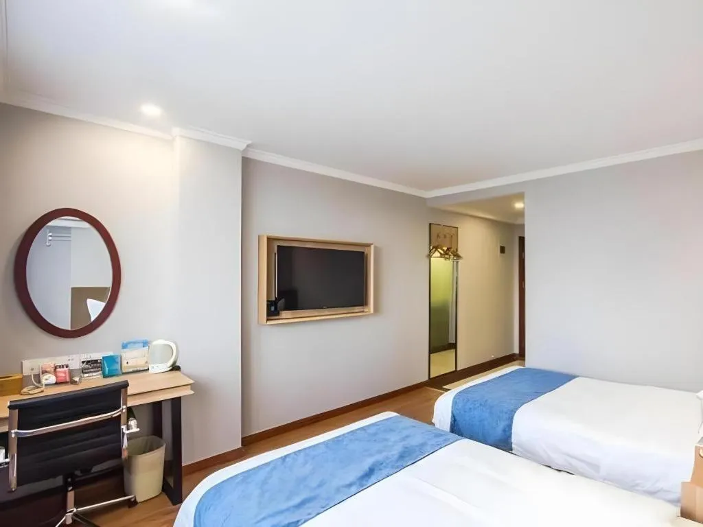 Bed in GreenTree Inn Jiaxing Tongxiang Tudian Express Hotel