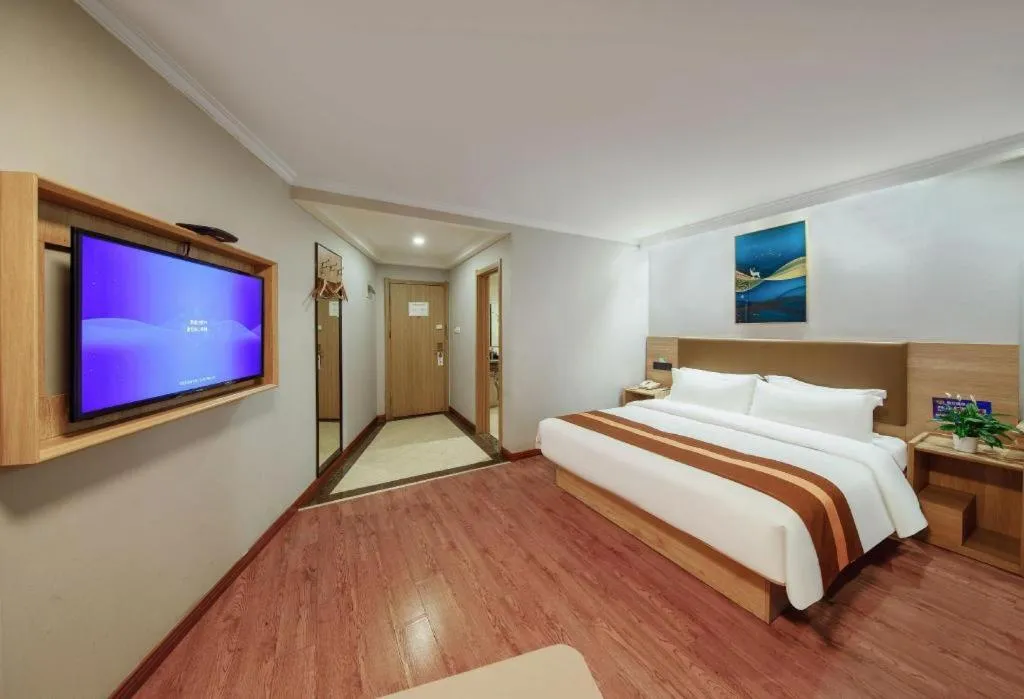 Bed in GreenTree Inn Jiaxing Tongxiang Tudian Express Hotel