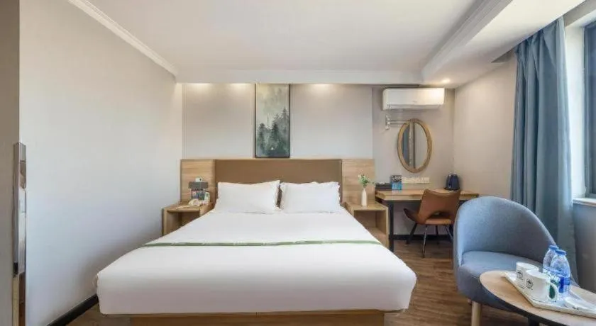 Bed in GreenTree Inn Jiaxing Tongxiang Tudian Express Hotel