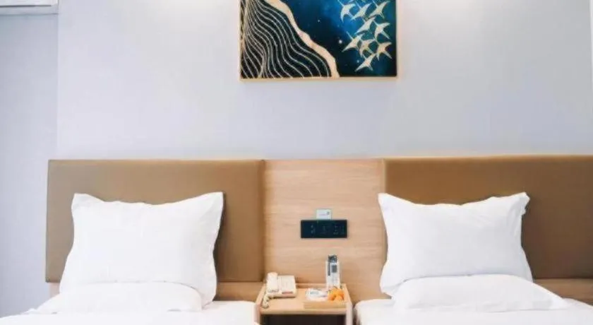 Bed in GreenTree Inn Jiaxing Tongxiang Tudian Express Hotel