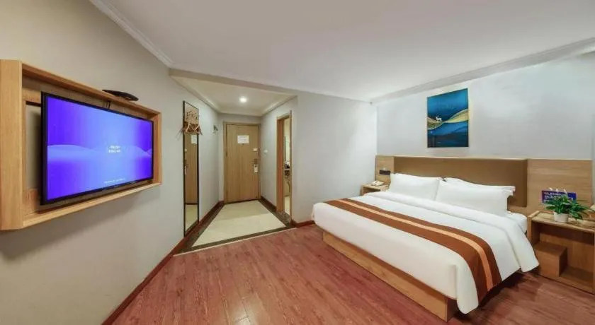 Bed in GreenTree Inn Jiaxing Tongxiang Tudian Express Hotel