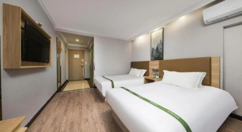 Bed in GreenTree Inn Jiaxing Tongxiang Tudian Express Hotel