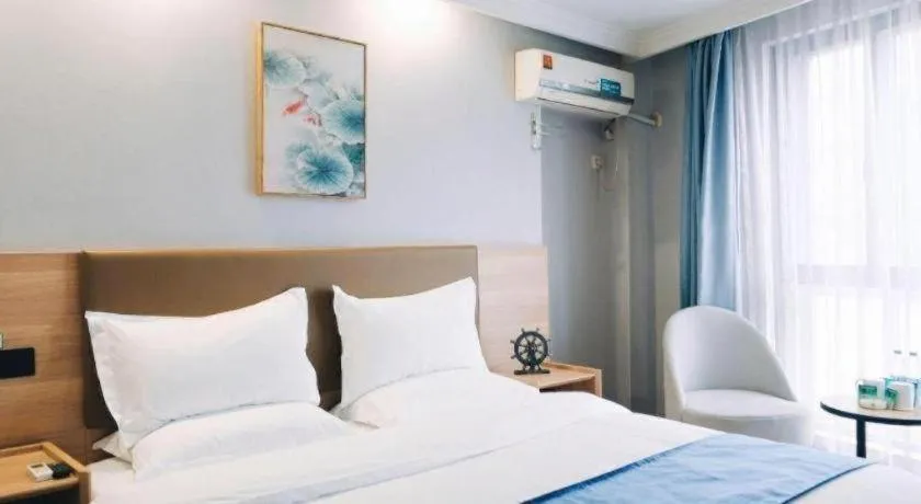 Bed in GreenTree Inn Jiaxing Tongxiang Tudian Express Hotel