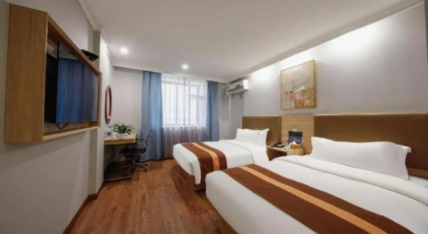 Bed in GreenTree Inn Jiaxing Tongxiang Tudian Express Hotel