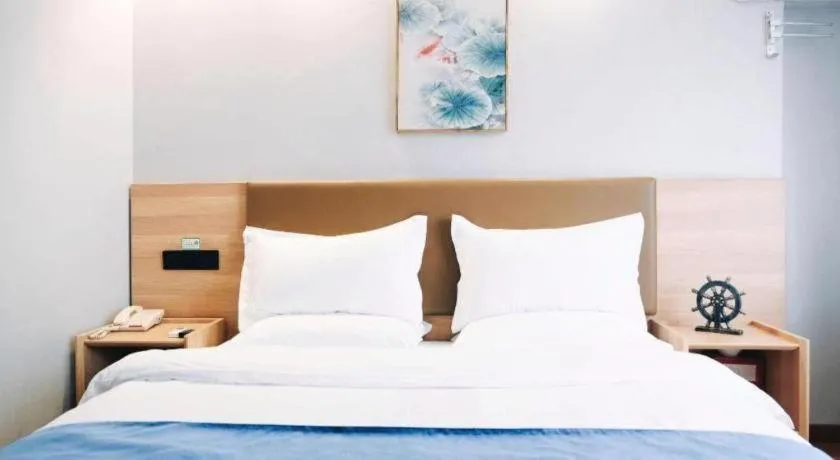 Bed in GreenTree Inn Jiaxing Tongxiang Tudian Express Hotel