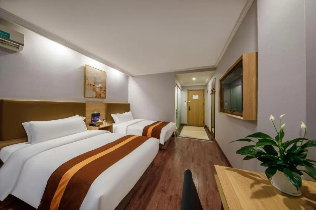 Bed in GreenTree Inn Jiaxing Tongxiang Tudian Express Hotel