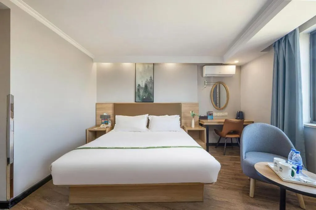 Bed in GreenTree Inn Jiaxing Tongxiang Tudian Express Hotel