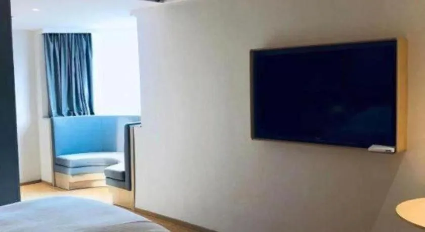 Bed in GreenTree Inn Lianyungang Suning Square Hualian Mantion Hotel