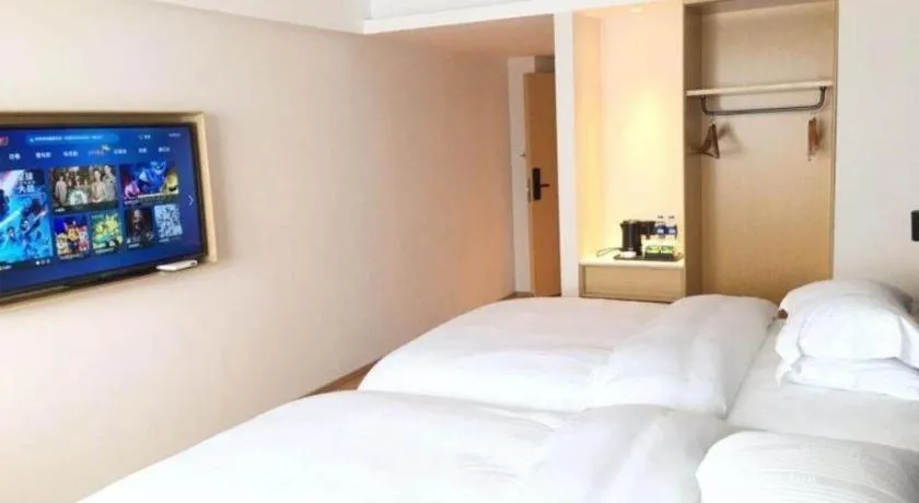 Bed in GreenTree Inn Lianyungang Suning Square Hualian Mantion Hotel