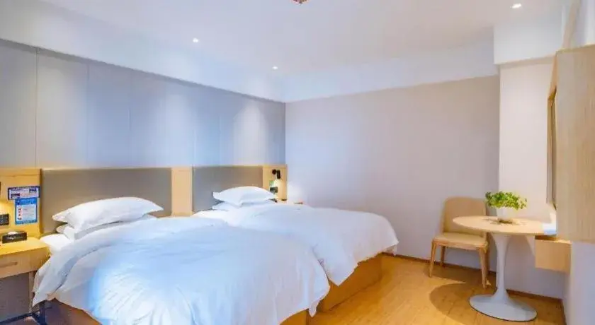 Bed in GreenTree Inn Lianyungang Suning Square Hualian Mantion Hotel Bed in GreenTree Inn Lianyungang Suning Square Hualian Mantion Hotel