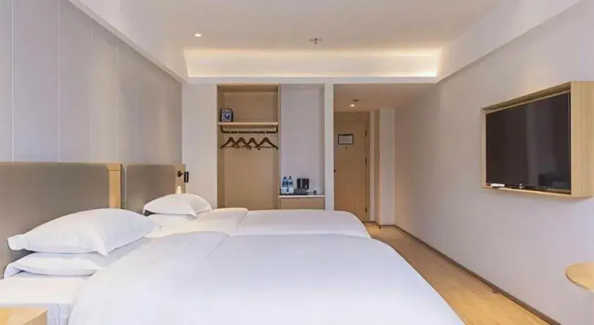 Bed in GreenTree Inn Lianyungang Suning Square Hualian Mantion Hotel Bed in GreenTree Inn Lianyungang Suning Square Hualian Mantion Hotel