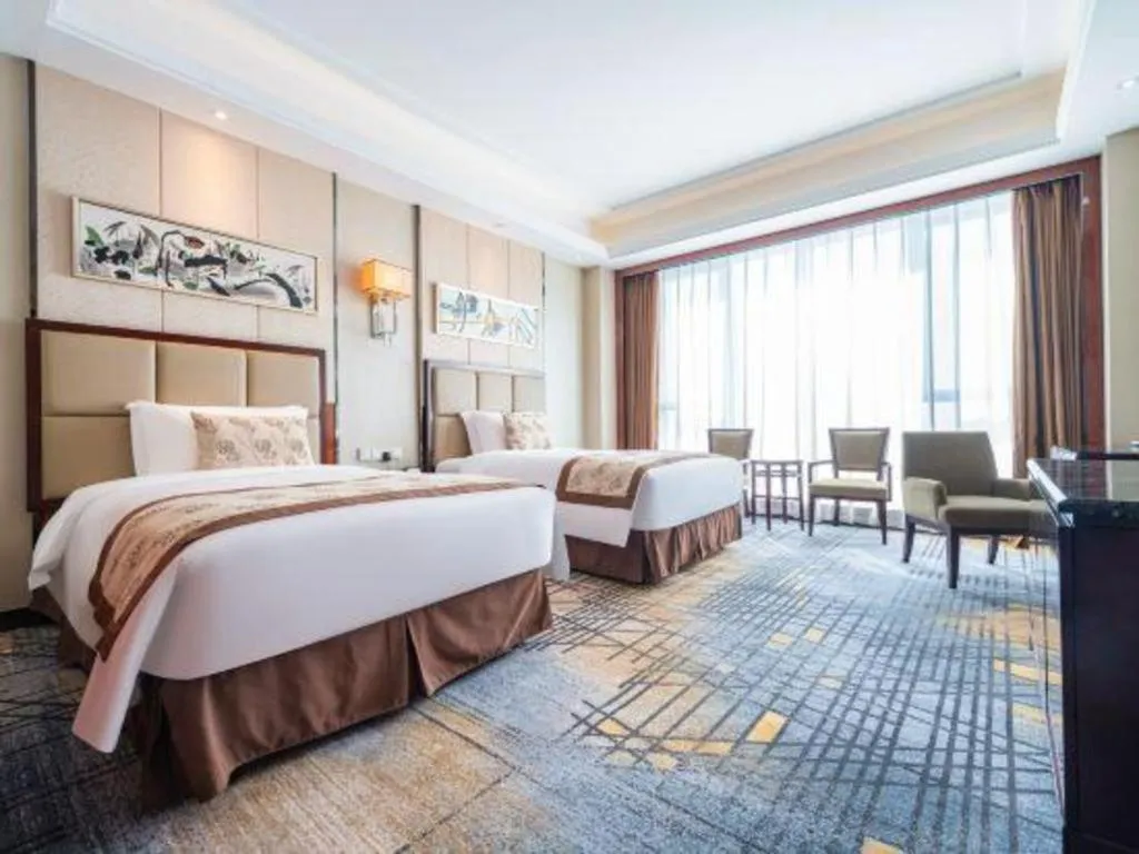 Bed in Eurasia Convention International Hotel