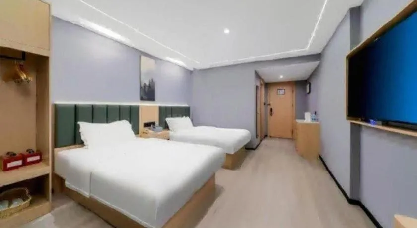 Bed in GreenTree Inn Taizhou Gaogang District Business Hotel