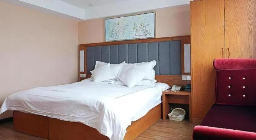 Bed in GreenTree Inn Taizhou Gaogang District Business Hotel