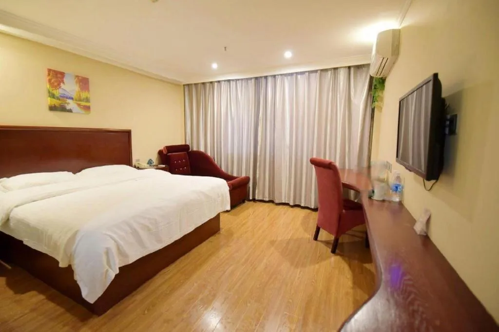 Bed in GreenTree Inn Taizhou Gaogang District Business Hotel