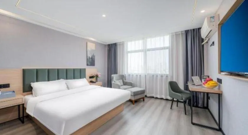 Bed in GreenTree Inn Taizhou Gaogang District Business Hotel