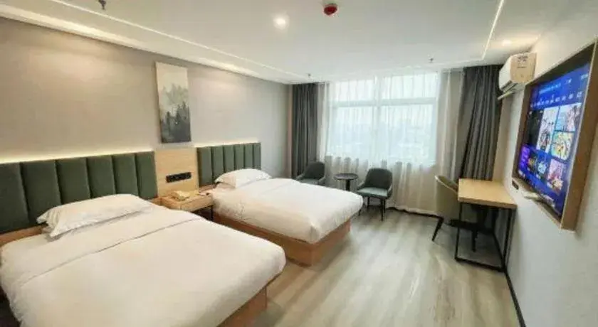 Bed in GreenTree Inn Taizhou Gaogang District Business Hotel Bed in GreenTree Inn Taizhou Gaogang District Business Hotel