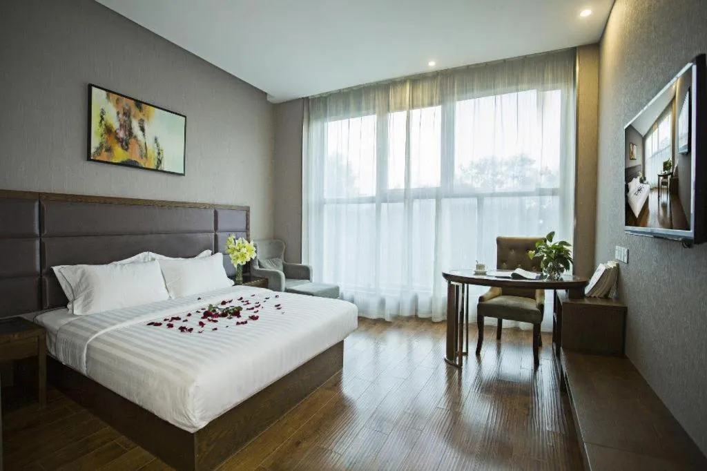 Bed in GreenTree Inn Taizhou Gaogang District Business Hotel