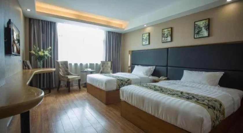 Bed in GreenTree Inn Taizhou Gaogang District Business Hotel