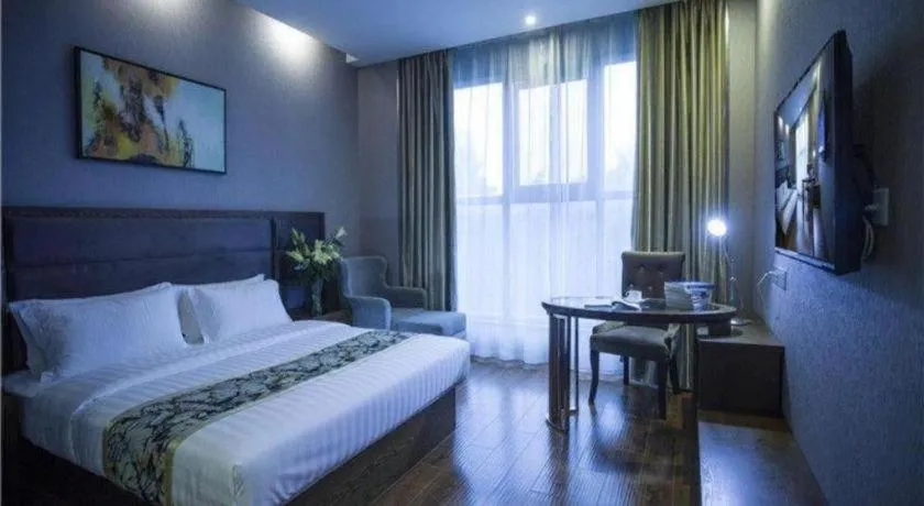 Bed in GreenTree Inn Taizhou Gaogang District Business Hotel